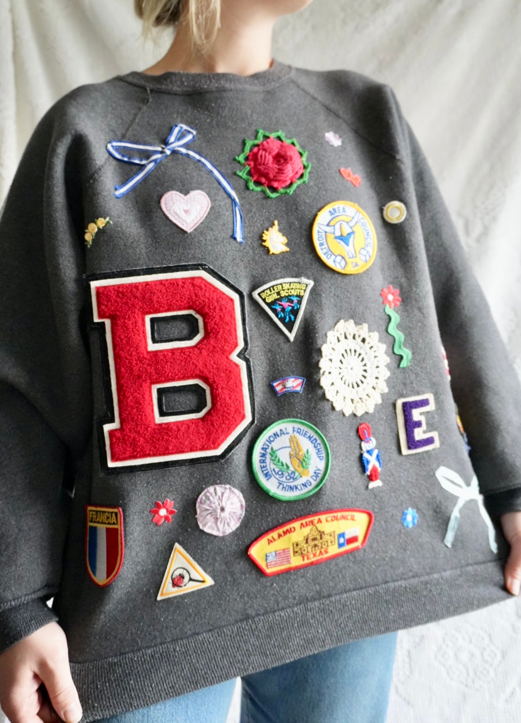 Patch Covered Sweatshirt